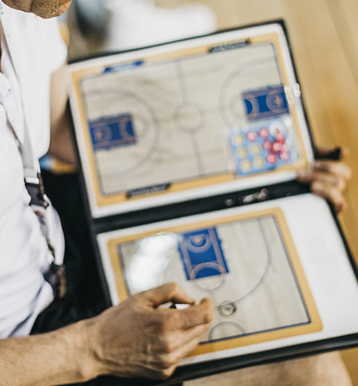 Close-up of basketball coach's tactics board — decision-making, game planning, and mental readiness